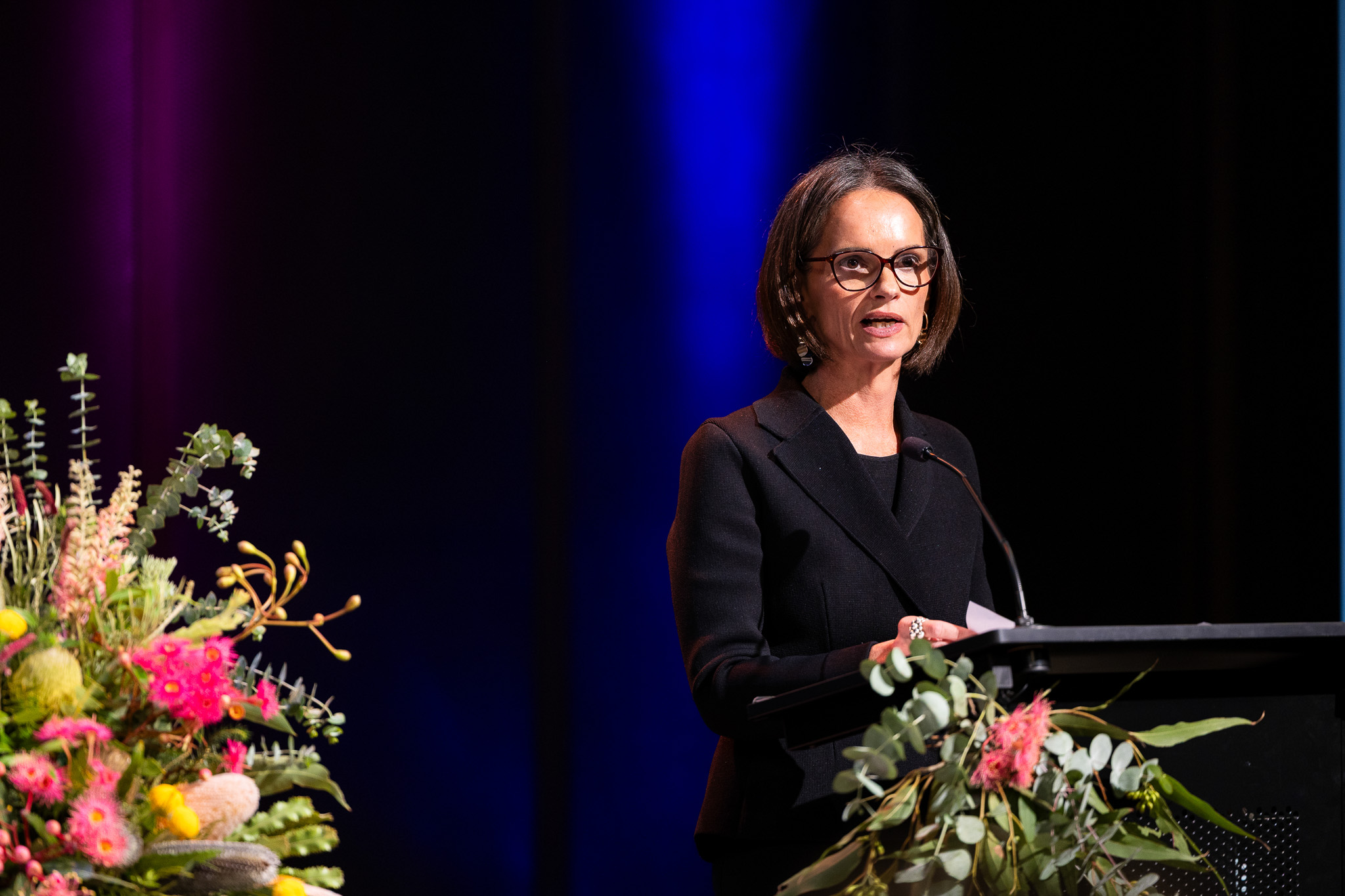 Justice Luise Taylor adressing the audience