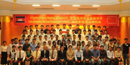Cambodian scholarship awardees pose for photos with Chinese embassy officials and Cambodian education officials in Phnom Penh, Cambodia, Aug. 8, 2014 / Khmer Times