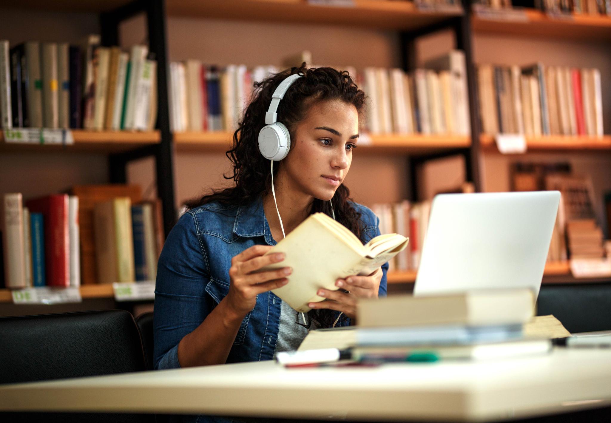 woman studying with laptop