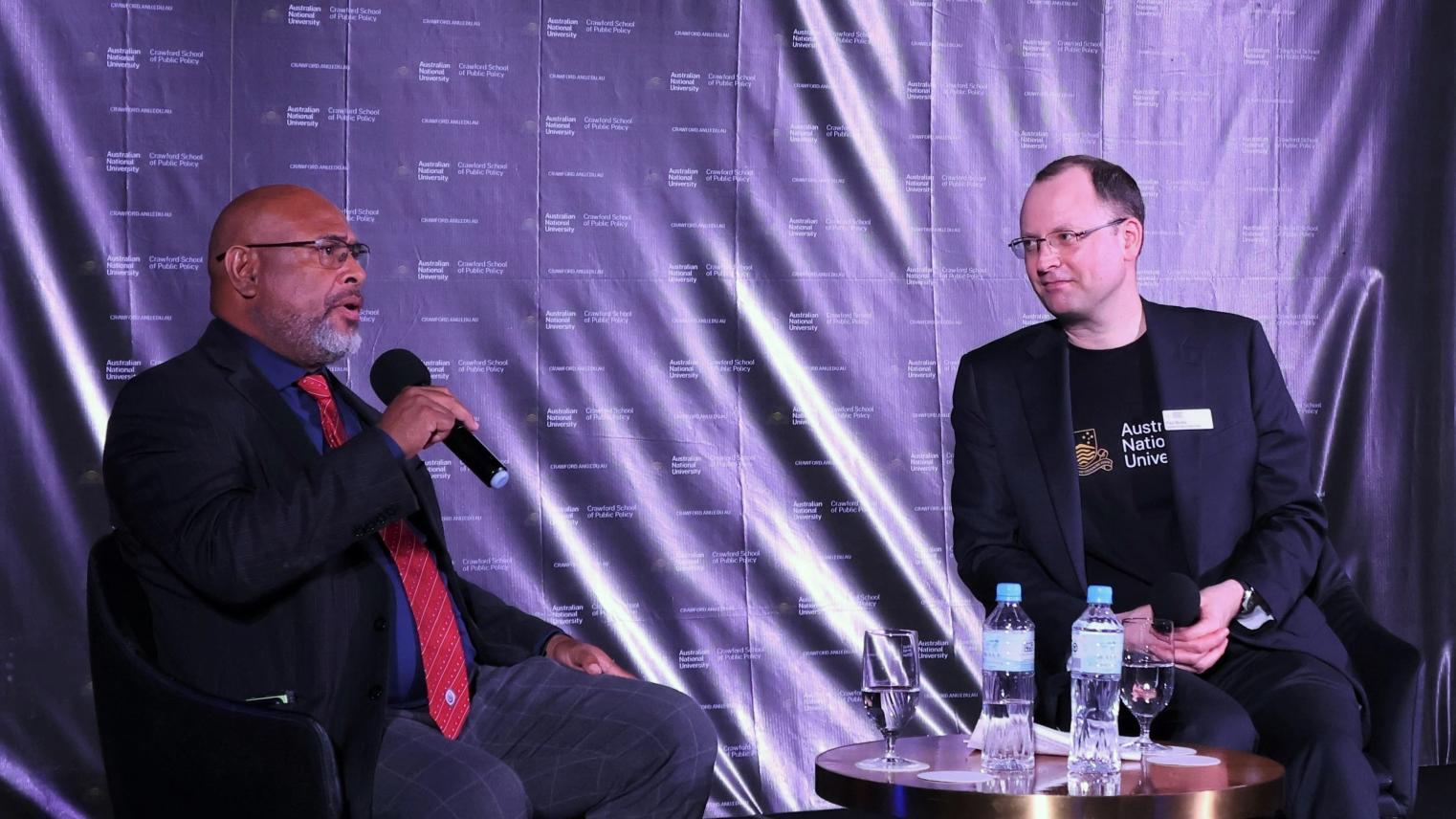 Dr Andrew Oaeke in conversation with Professor Paul Burke Crawford School Alumni Dialogue in Port Moresby Papua New Guinea