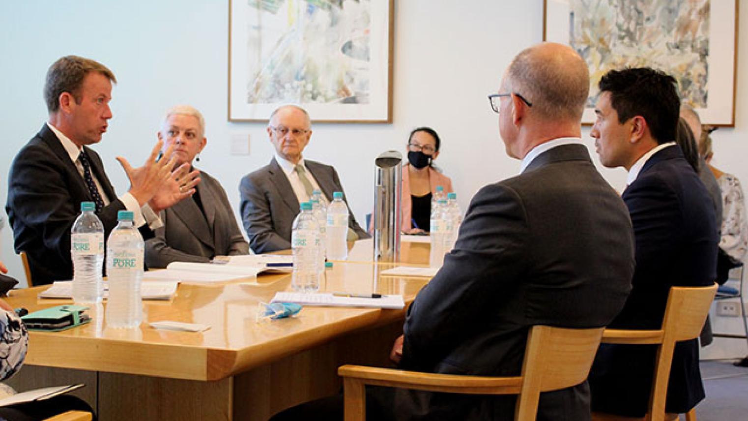Minister for Trade The Hon Dan Tehan (at left) in discussion with Australia-Japan Research Centre Director Dr Shiro Armstrong (opposite). Photo: Supplied, ANU.